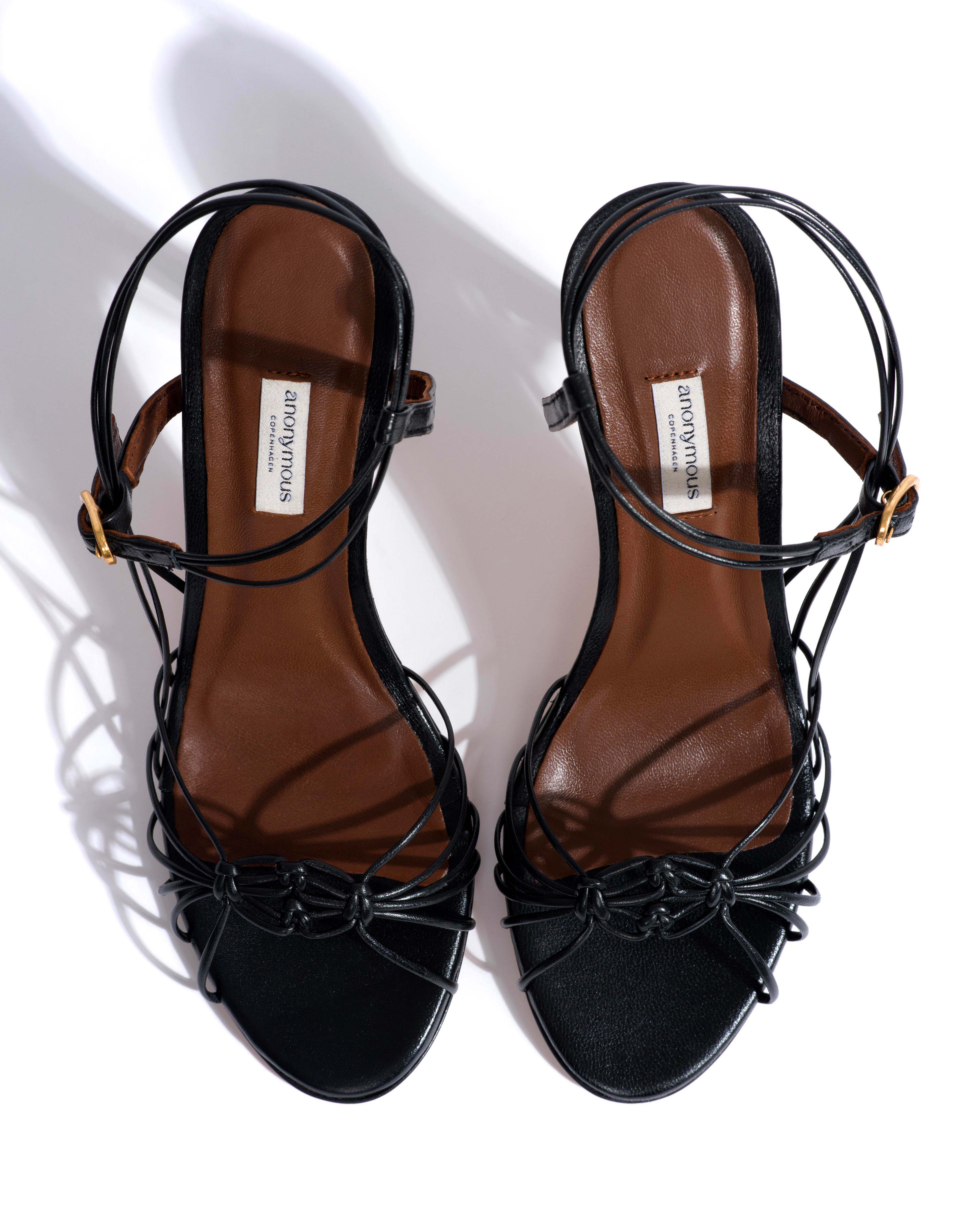 Savannah 100 hand-braided Shiny lamb Black