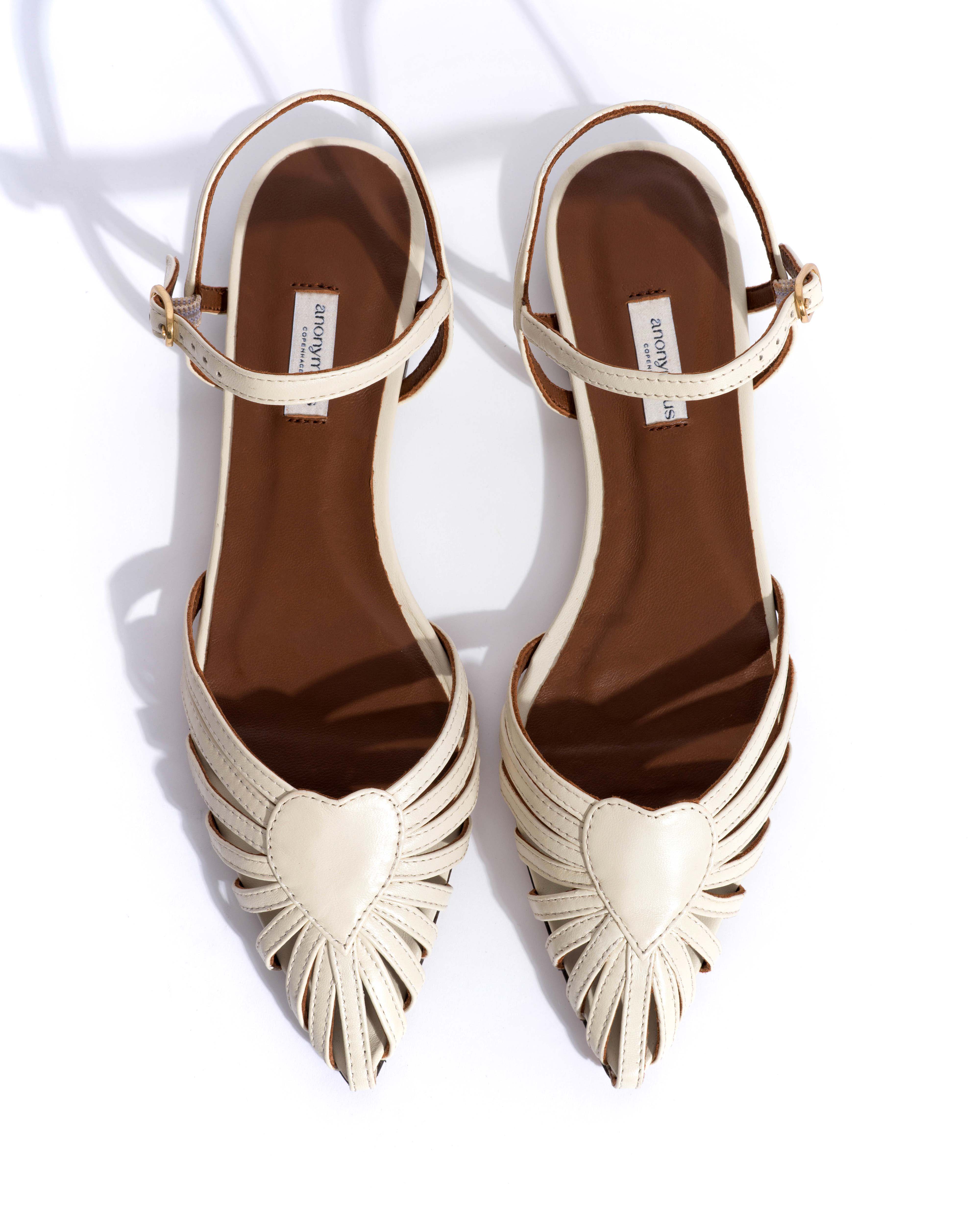 Keesha 10 Shiny lamb White sand