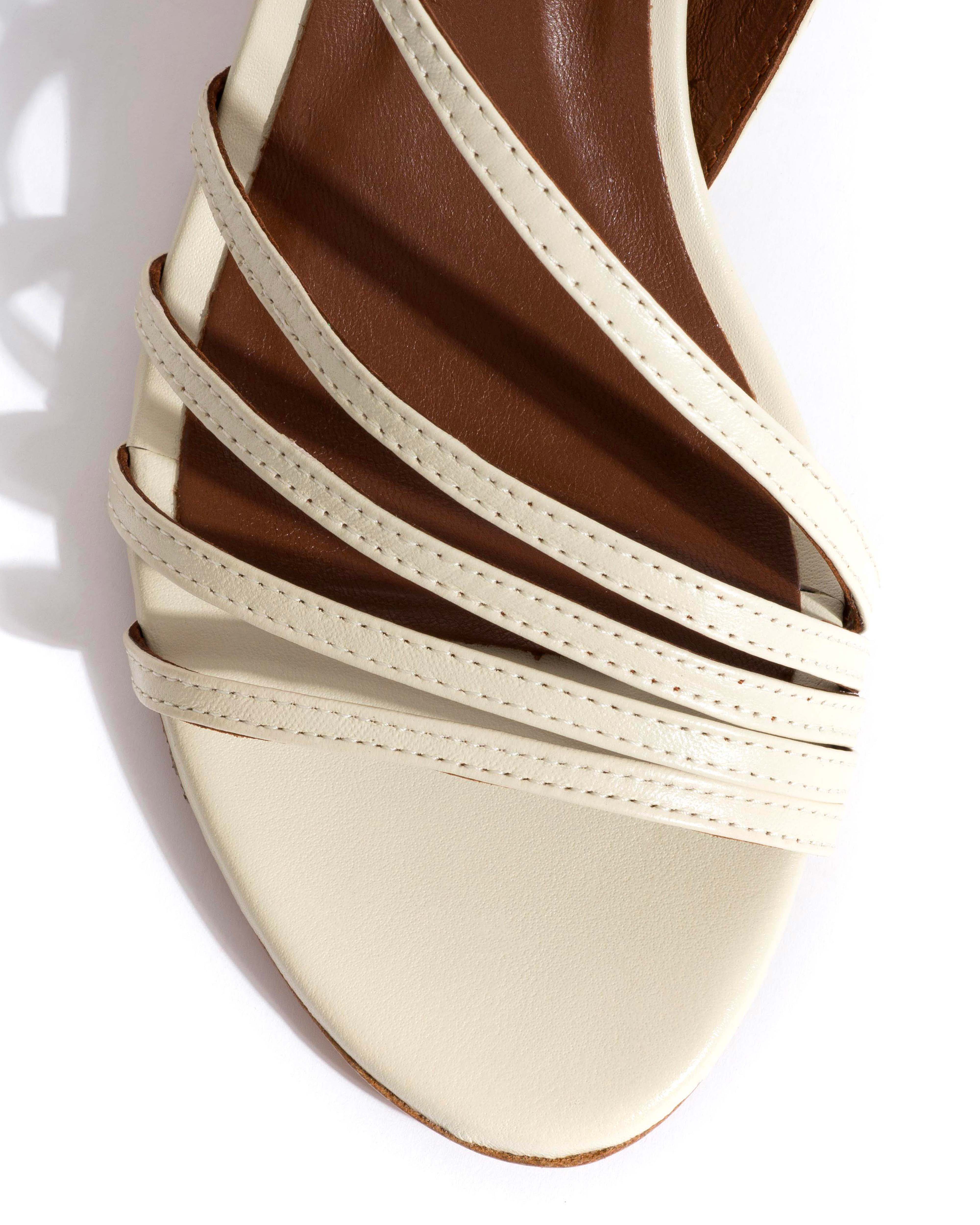 Naia 55 Shiny lamb White sand